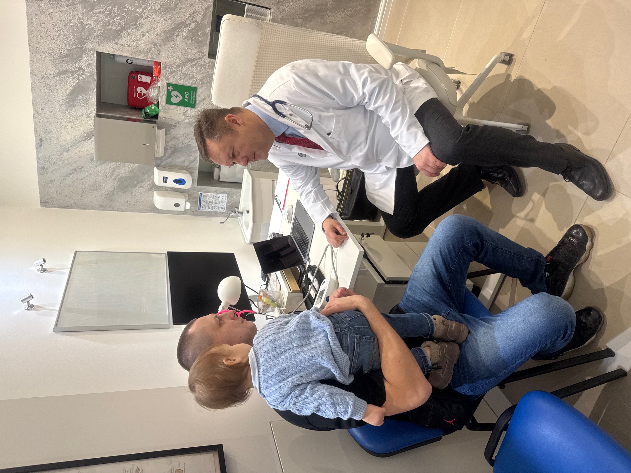 The Father visited the doctor with his child for a medical consultation